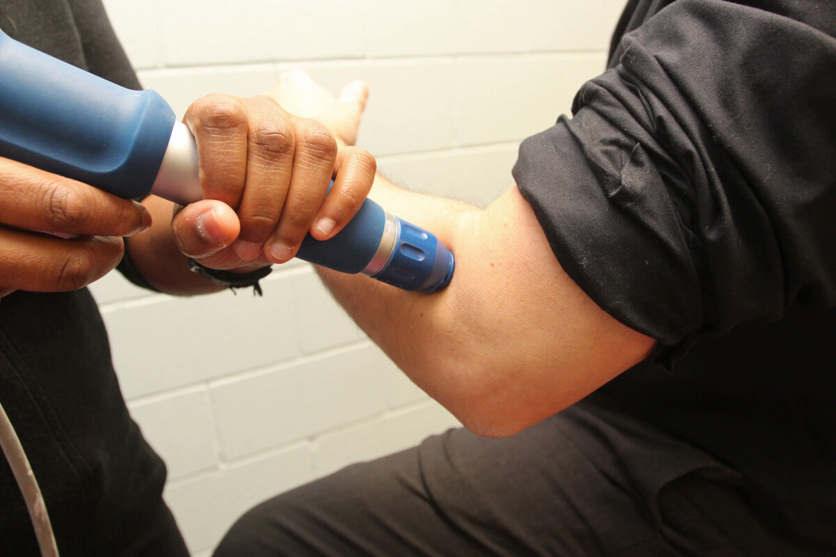Picture of shockwave device on elbow